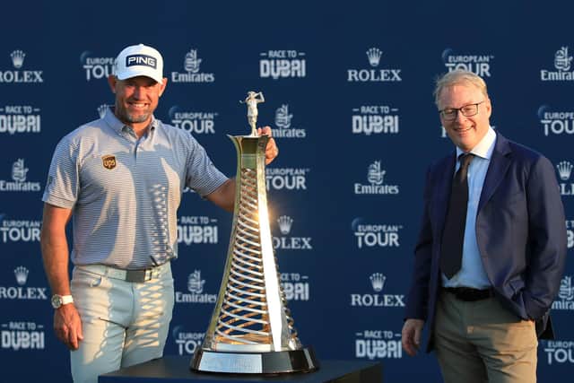 Lee Westwood poses withe Race to Dubai Trophy alongside European Tour chief executive Keith Pelley following the final round of the DP World Tour Championship at Jumeirah Golf Estates in Dubai. Picture: Andrew Redington/Getty Images