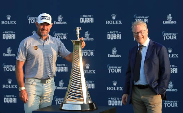 Lee Westwood poses withe Race to Dubai Trophy alongside European Tour chief executive Keith Pelley following the final round of the DP World Tour Championship at Jumeirah Golf Estates in Dubai. Picture: Andrew Redington/Getty Images