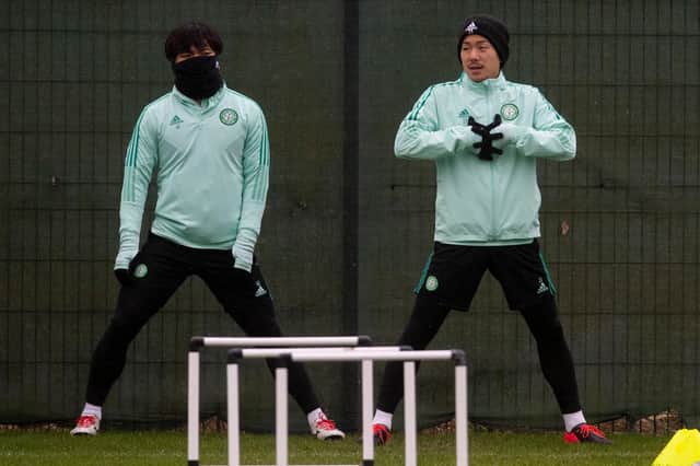 Yosuke Ideguchi, right, is back in the Celtic squad for the match against Dundee.
