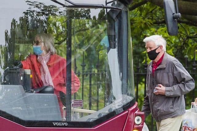 Face coverings are now compulsory in shops as well as on public transport.