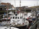 Fishing boats moored in Eyemouth Harbour, Scottish Borders. Leading representatives of Scotland's fishing industry have called on the Scottish Government to have a "radical rethink" on its plans to introduce new conservation zones at sea. T