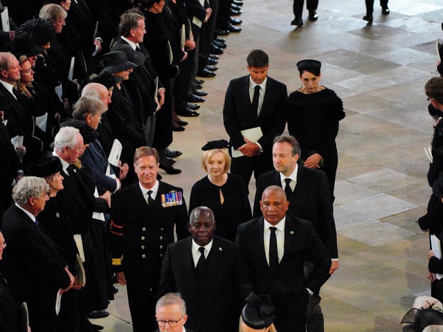Prime Minister Liz Truss and husband Hugh O'Leary (centre right) followed by New Zealand's Prime Minister Jacinda Ardern arrive at the Committal Service for Queen Elizabeth II held at St George's Chapel in Windsor Castle, Berkshire. Picture date: Monday September 19, 2022.
