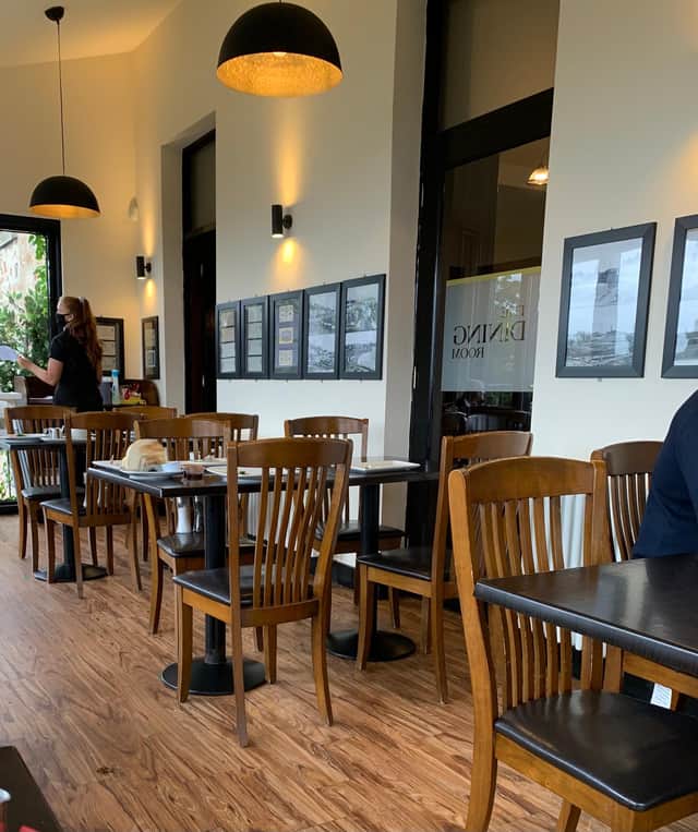 The spacious, light-filled dining room has views over the harbour.