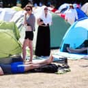 A spectator in the overnight queue ahead of the Wimbledon Championships, which start today. Picture: Mike Egerton/PA Wire