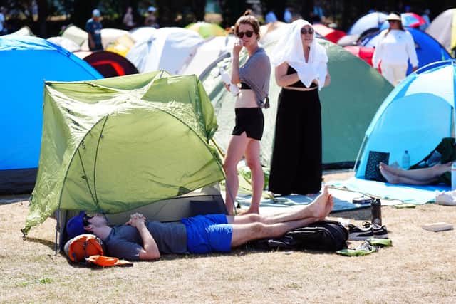 A spectator in the overnight queue ahead of the Wimbledon Championships, which start today. Picture: Mike Egerton/PA Wire