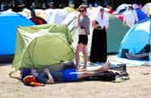 A spectator in the overnight queue ahead of the Wimbledon Championships, which start today. Picture: Mike Egerton/PA Wire