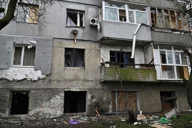This photograph shows a damaged residential multi-storey building in Kherson. Picture: AFP via Getty Images
