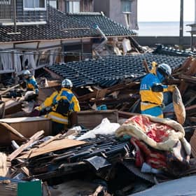 Police officers search for missing persons in the aftermath of an earthquake on New Year's Day in Suzu, Japan. A series of major earthquakes have reportedly killed at least 78 people, injured dozens more and destroyed a large amount of homes.