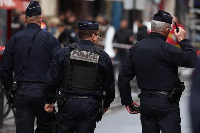 French police secure the street after several shots were fired along rue d'Enghien in the 10th arrondissement, in Paris on December 23, 2022. - Two people were killed and four injured in a shooting in central Paris on December 23, 2022, police and prosecutors said.. (Photo by Thomas SAMSON / AFP) (Photo by THOMAS SAMSON/AFP via Getty Images)