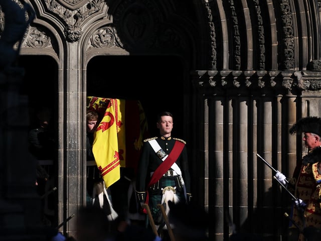 Pallbearers carry the coffin of Queen Elizabeth II from St Giles' Cathedral, Edinburgh after a prayer service.