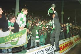 Hibs goalkeeper John Burridge shows the Skol Cup to fans after the team returned to Easter Road following the 1991 victory over Dunfermline at Hampden (PHOTOGRAPHER ALAN LEGERWOOD)