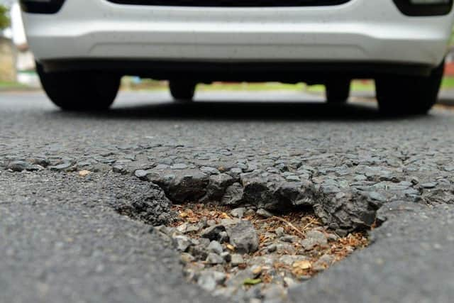 Each pot hole costs an average £40 to fix