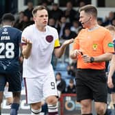 Hearts' Lawrence Shankland protests his innocence after being booked by referee Grant Irvine for a dive in the box during the defeat to Ross County. (Photo by Ross Parker / SNS Group)