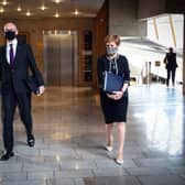 Deputy First Minister John Swinney alongside First Minister Nicola Sturgeon. Picture: Andy Buchanan/POOL/AFP via Getty Images