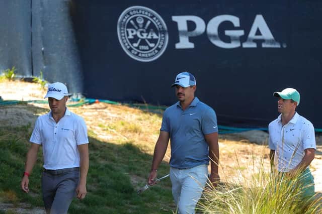 Justin Thomas, Brooks Koepka and Rory McIlroy walk to the 17th green during the first round of the 2021 PGA Championship at Kiawah Island Resort's Ocean Course in Kiawah Island, South Carolina. Picture: Stacy Revere/Getty Images.