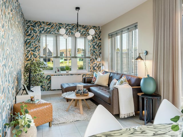 Interior: The ground floor comprises a formal lounge and open-plan kitchen and dining room. There is an integrated double garage and utility room. The bedrooms are upstairs and the fifth could be used as an office.