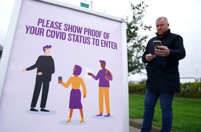Signage informing spectators they need to show their vaccine passports to enter the ground at Celtic Park, Glasgow.