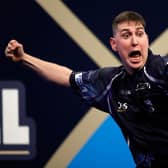 William Borland reacts to his nine dart finish in the final leg of his victory over Bradley Brooks in the William Hill World Darts Championship at Alexandra Palace. (Photo by Luke Walker/Getty Images)
