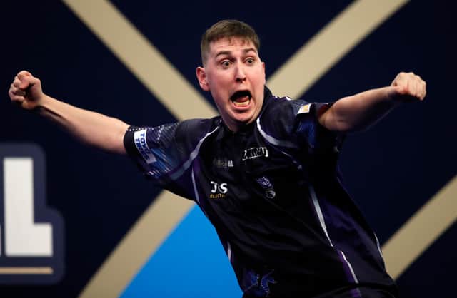 William Borland reacts to his nine dart finish in the final leg of his victory over Bradley Brooks in the William Hill World Darts Championship at Alexandra Palace. (Photo by Luke Walker/Getty Images)
