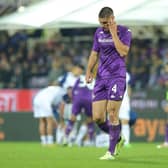 Nikola Milenkovic of Fiorentina shows his dejection during the Serie A defeat by Lazio on Monday.