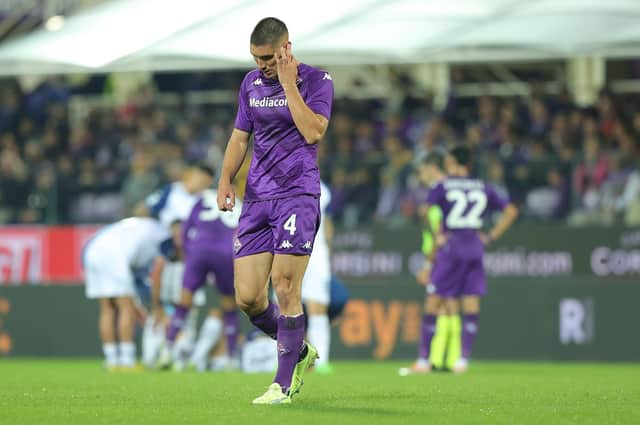 Nikola Milenkovic of Fiorentina shows his dejection during the Serie A defeat by Lazio on Monday.