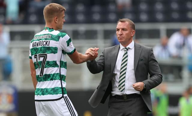 Celtic manager Brendan Rodgers and Maik Nawrocki, who has picked up an injury following the 1-0 defeat at Kilmarnock on Sunday. (Photo by Craig Williamson / SNS Group)