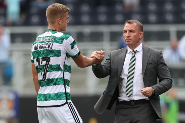 Celtic manager Brendan Rodgers and Maik Nawrocki, who has picked up an injury following the 1-0 defeat at Kilmarnock on Sunday. (Photo by Craig Williamson / SNS Group)