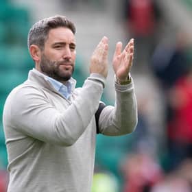 Hibs manager Lee Johnson applauds the home fans after the 3-1 win over Aberdeen. (Photo by Paul Devlin / SNS Group)