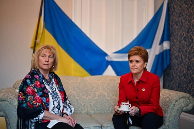 First Minister Nicola Sturgeon meets Senia Urquhart at the Edinburgh Ukrainian Club, to speak to members of the Ukrainian community about their concerns and view some of the donations that are being processed at the club. Picture date: Wednesday March 9, 2022.