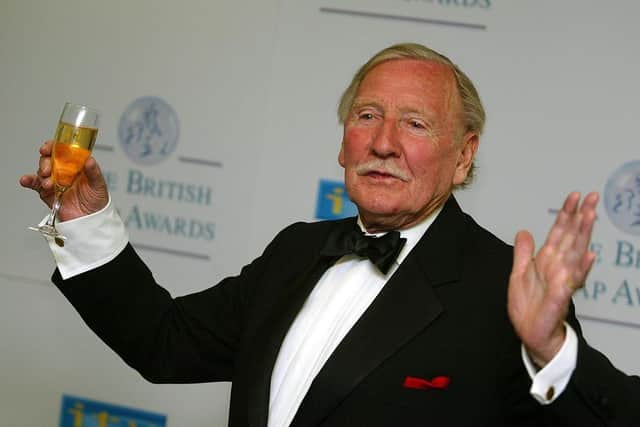 Leslie Phillips hams it up for the camera at an event in 2004 (Picture: Bruno Vincent/Getty Images)