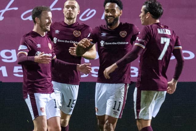 Andy Halliday (L) celebrates with teammates after scoring Hearts' sixth goal in 6-2 win over Dundee on Friday night (Photo by Ross Parker / SNS Group)