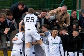 Edinburgh City's Innes Murray (29) celebrates his goal with fans against Annan Athletic.