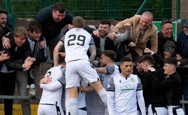 Edinburgh City's Innes Murray (29) celebrates his goal with fans against Annan Athletic.