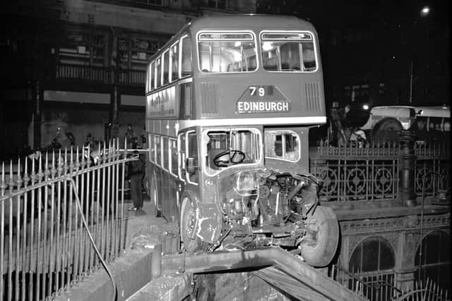 An Eastern Scottish bus crashed into the railings at the top of the Waverley Bridge, near the Waverley Market in Edinburgh in November 1970 Pic Hamish Campbell