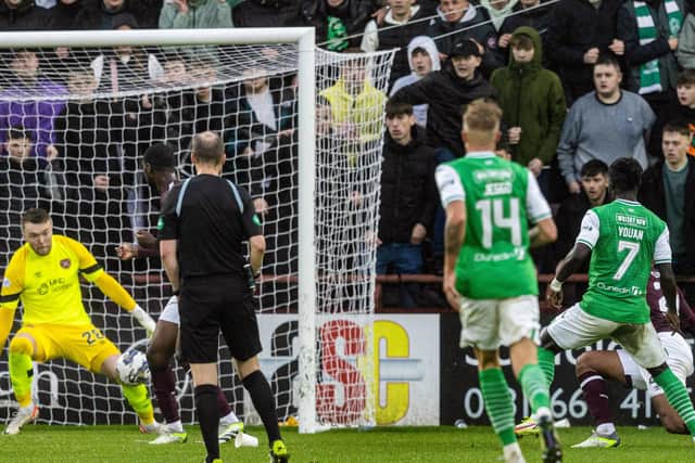 Elie Youan struck twice to rescue a point for Hibs against Hearts at Tynecastle.
