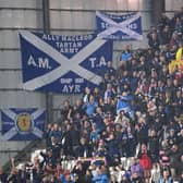 Scotland fans had a nervy night in Torshavn. (Photo by JONATHAN NACKSTRAND/AFP via Getty Images)