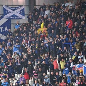 Scotland fans had a nervy night in Torshavn. (Photo by JONATHAN NACKSTRAND/AFP via Getty Images)