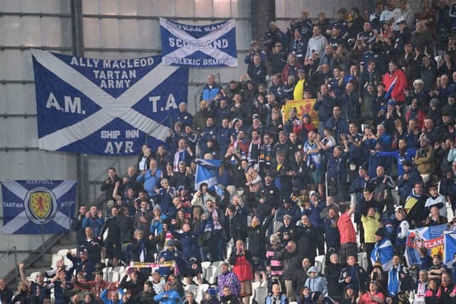 Scotland fans had a nervy night in Torshavn. (Photo by JONATHAN NACKSTRAND/AFP via Getty Images)