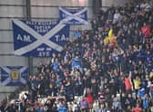 Scotland fans had a nervy night in Torshavn. (Photo by JONATHAN NACKSTRAND/AFP via Getty Images)