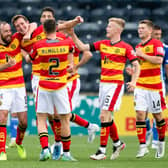 Partick's Aaron Muirhead (centre) celebrates his equaliser at Kilmarnock. (Photo by Ewan Bootman / SNS Group)