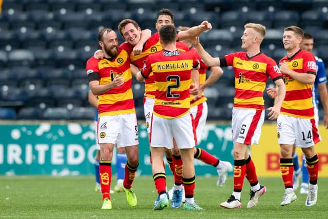 Partick's Aaron Muirhead (centre) celebrates his equaliser at Kilmarnock. (Photo by Ewan Bootman / SNS Group)