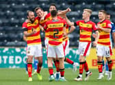Partick's Aaron Muirhead (centre) celebrates his equaliser at Kilmarnock. (Photo by Ewan Bootman / SNS Group)