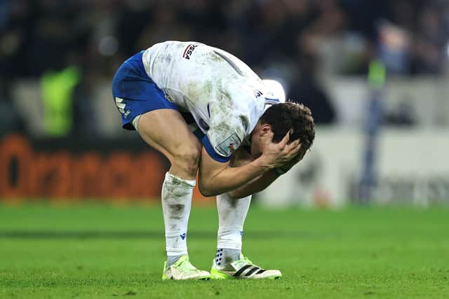 Paolo Garbisi of Italy looks dejected after missing a last minute, match winning penalty against France.