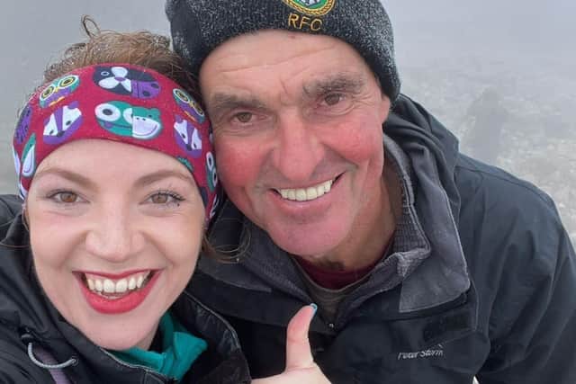 Trevor Botwood and Courtney Ferguson. The physiotherapist and the man whose life she saved after he collapsed on Britain's highest mountain have returned to finally make it to the summit together two years on. Picture: Courtney Ferguson/NHS Lothian/PA Wire