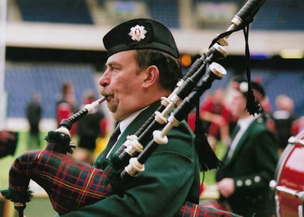 Gordon Campbell taught hundreds of bagpipe players in Scotland and abroad; here he is at Murrayfield Stadium in 2004