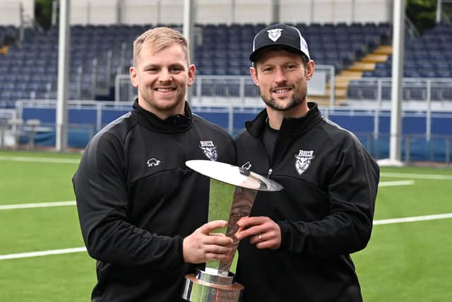 Pete Horne (right) holds the Super6 trophy with then Ayrshire Bulls head coach Pat McArthur after the victory over Southern Knights in last year's final. (Photo by Paul Devlin / SNS Group)
