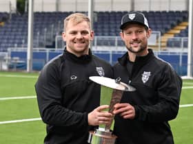 Pete Horne (right) holds the Super6 trophy with then Ayrshire Bulls head coach Pat McArthur after the victory over Southern Knights in last year's final. (Photo by Paul Devlin / SNS Group)