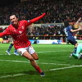 Harry McKirdy of Swindon Town, pictured scoring against Man City in the FA Cup in January, is only one of several names on a list of potential Hibs targets this summer. (Photo by Michael Regan/Getty Images)