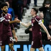 Hearts' Aaron McEneff, left, celebrates with Ellis Simms after making it 3-2 against St Mirren.
