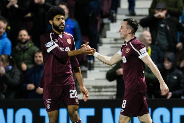 Hearts' Aaron McEneff, left, celebrates with Ellis Simms after making it 3-2 against St Mirren.